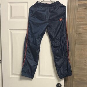Nike Dark Blue Pants with Orange Details . Age 10-12 yr boy size